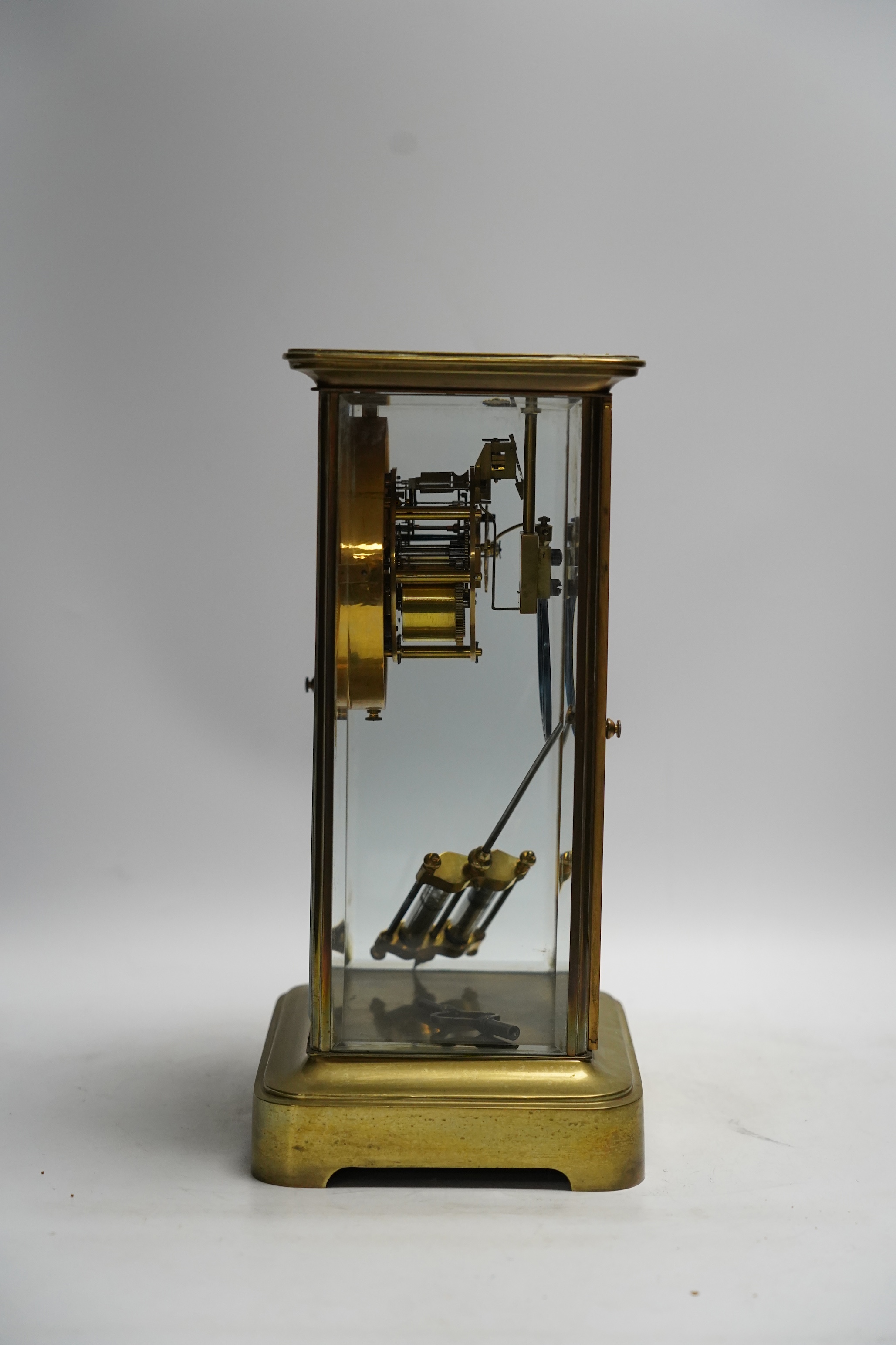 A French four glass mantel clock with mercury suspension and pendulum, 33cm